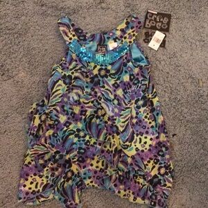 Children’s turquoise ruffled blouse